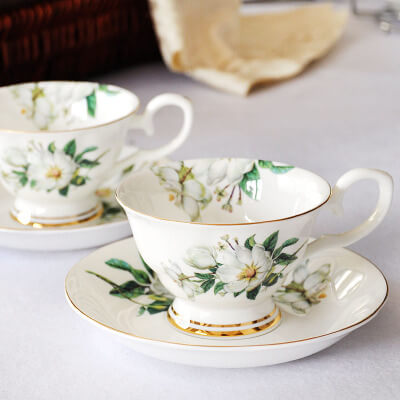 bone china cup and saucer set with white flower decoration