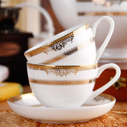 bone china cup with gold designs decoration