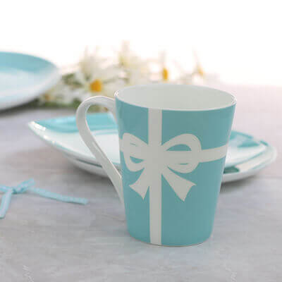 blue bone china mug with bow tie design