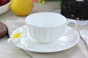white bone china cup and saucer