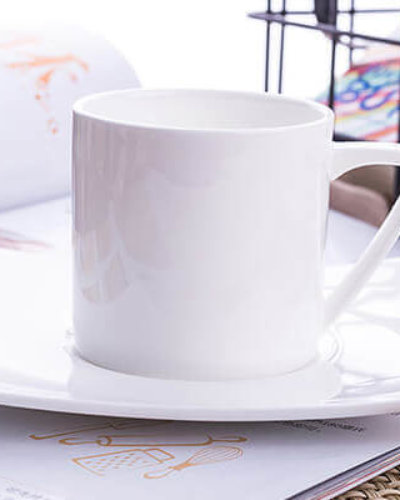 white bone china cup with square saucer