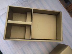 golden color box with paper divider